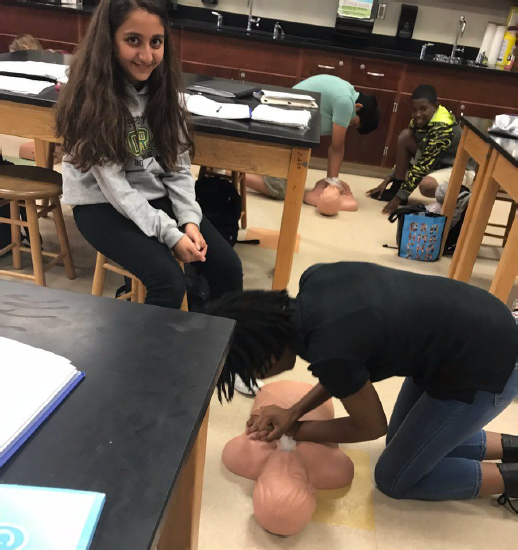 Students practicing CPR
