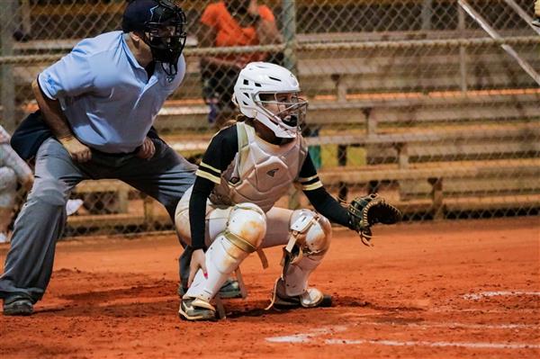 Softball catcher in action
